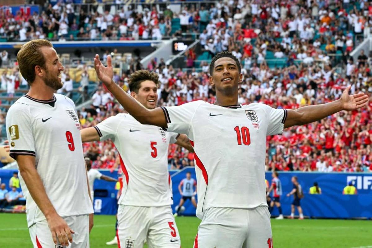 Jude Bellingham celebrating after scoring the winning goal for England against Norway in the 2026 World Cup quarter-final.