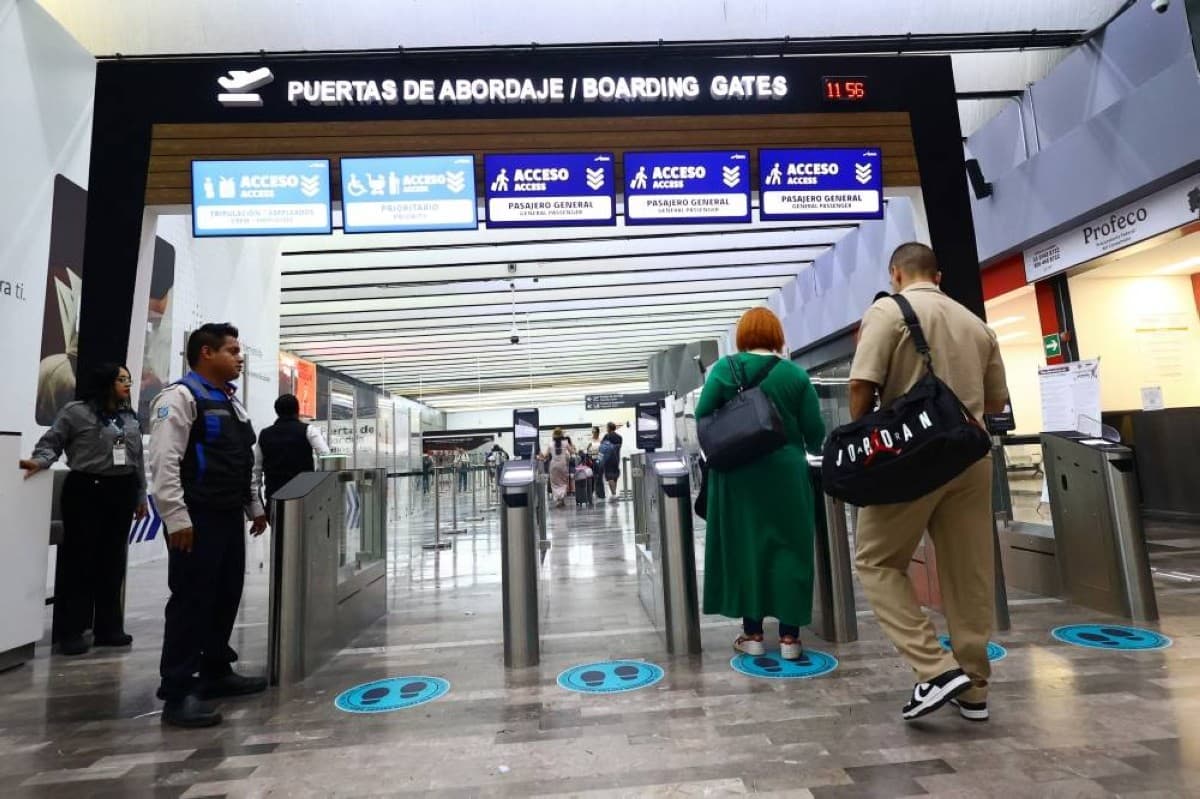 A traveller at a Japanese airport departure hall, reflecting the decline in outbound travel amid a weakening yen and rising costs.