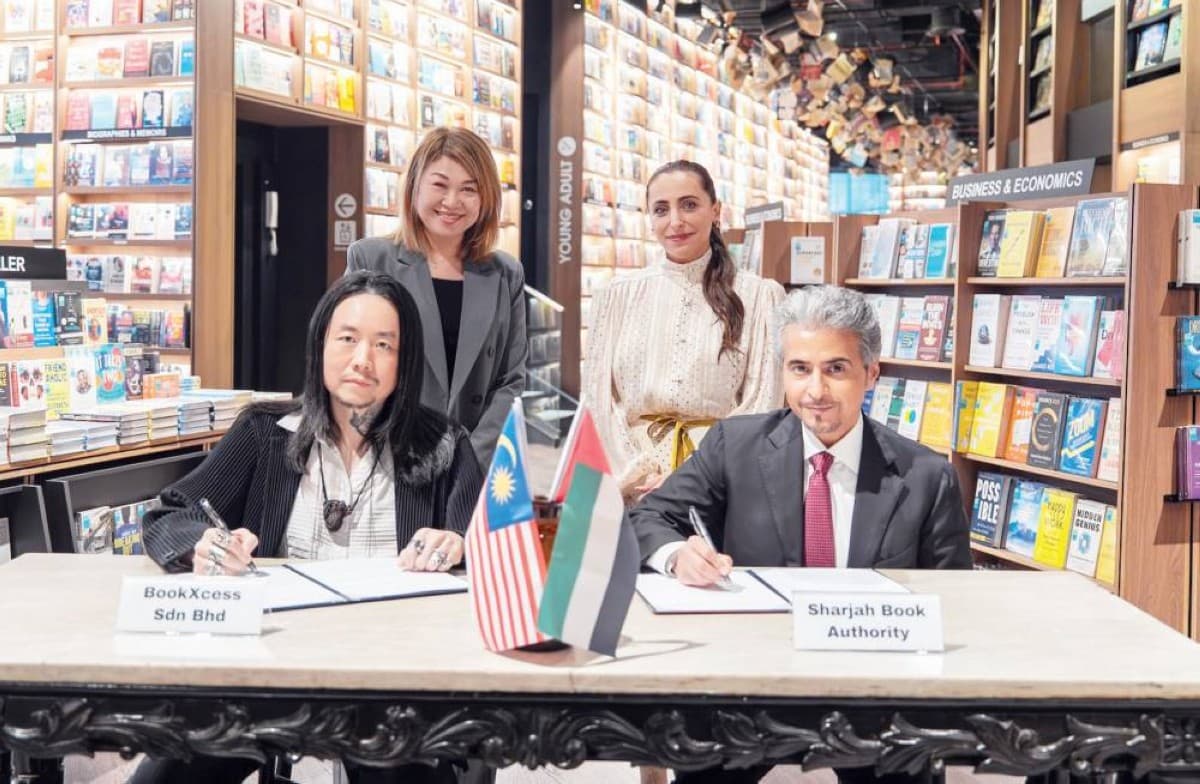 Sheikha Bodour bint Sultan Al Qasimi and Ahmed bin Rakkad Al Ameri at the signing of the MoU with BookXcess Malaysia at The Sunway Library in Malaysia.
