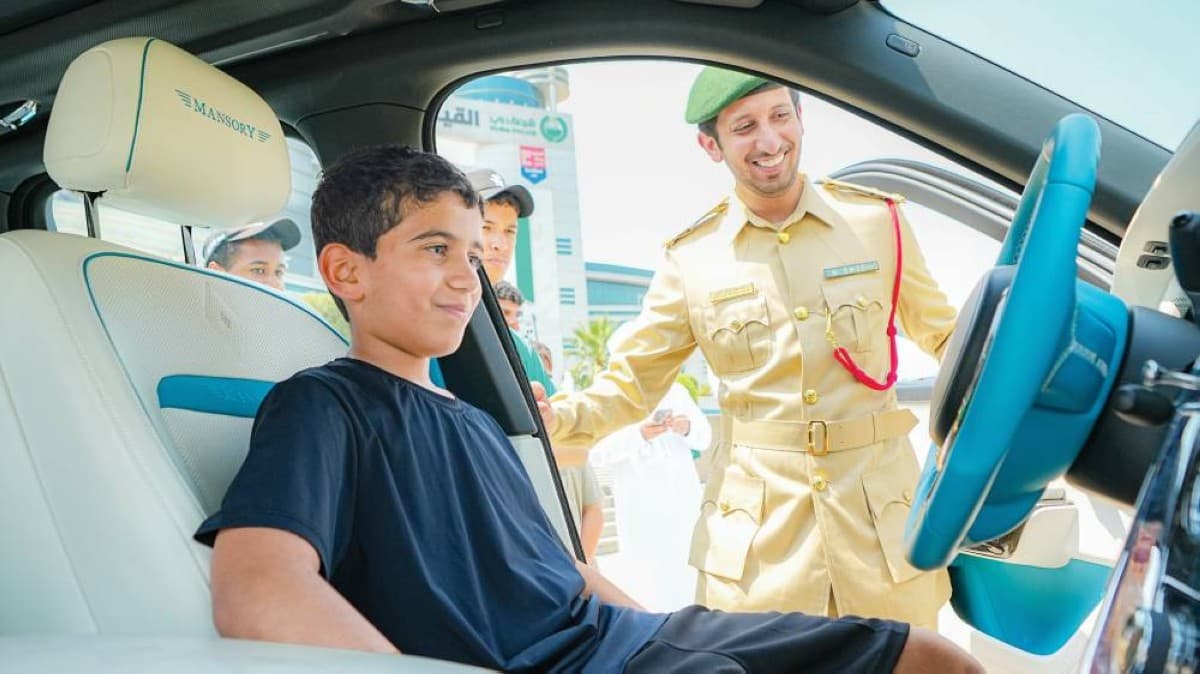 Students participating in Dubai Police's 'Future Security Leaders' programme during a field visit to one of the force's departments.