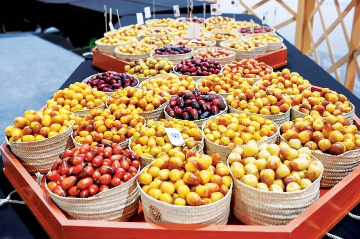 Visitors browse displays of dates and date palm products at the Liwa Date Festival in the Al Dhafra region of Abu Dhabi.