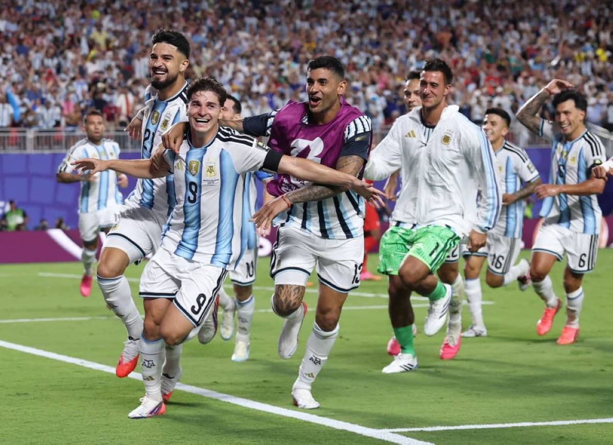 Argentina players celebrate after advancing to the World Cup semi-finals following their quarter-final victory over Switzerland.