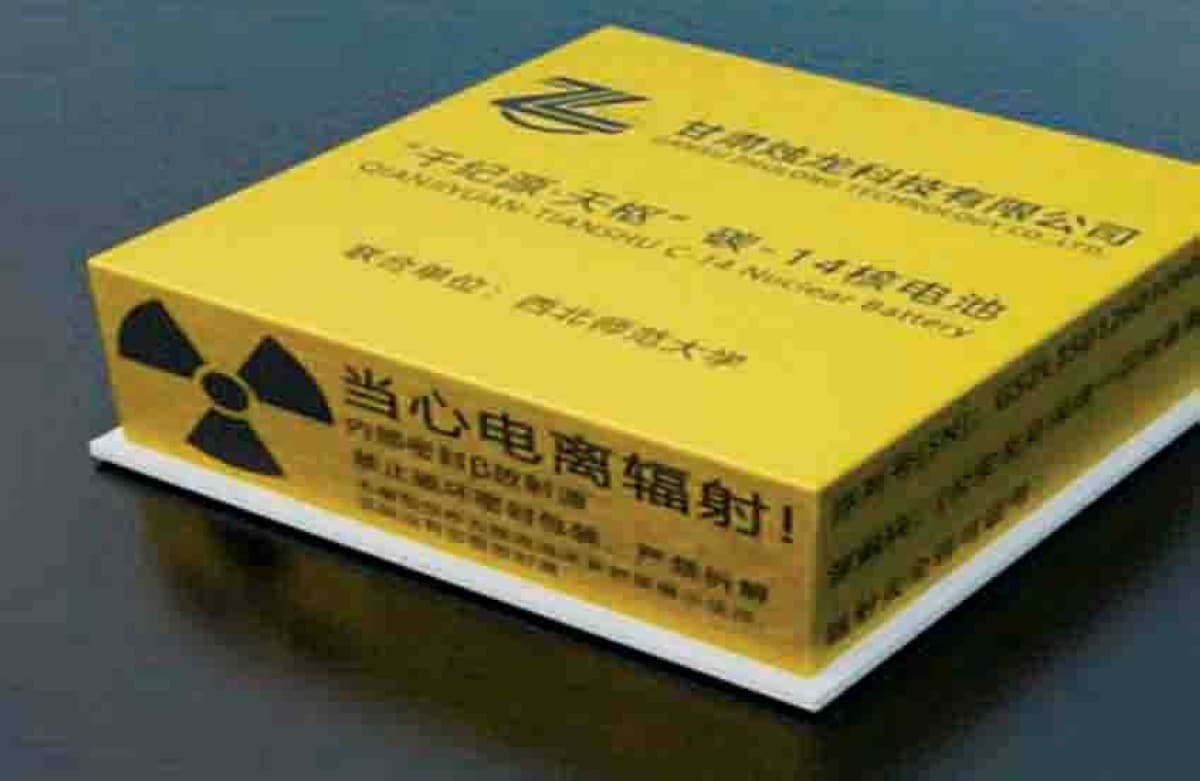 A close-up of a compact nuclear battery device developed by Chinese scientists using carbon-14 isotopes and a silicon carbide converter.