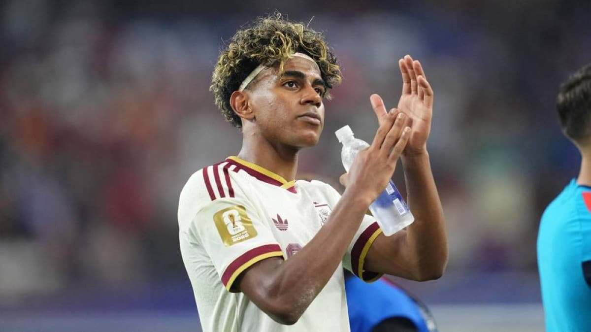 Lamine Yamal in action for Spain during the 2026 World Cup, celebrating with teammates after a victory.