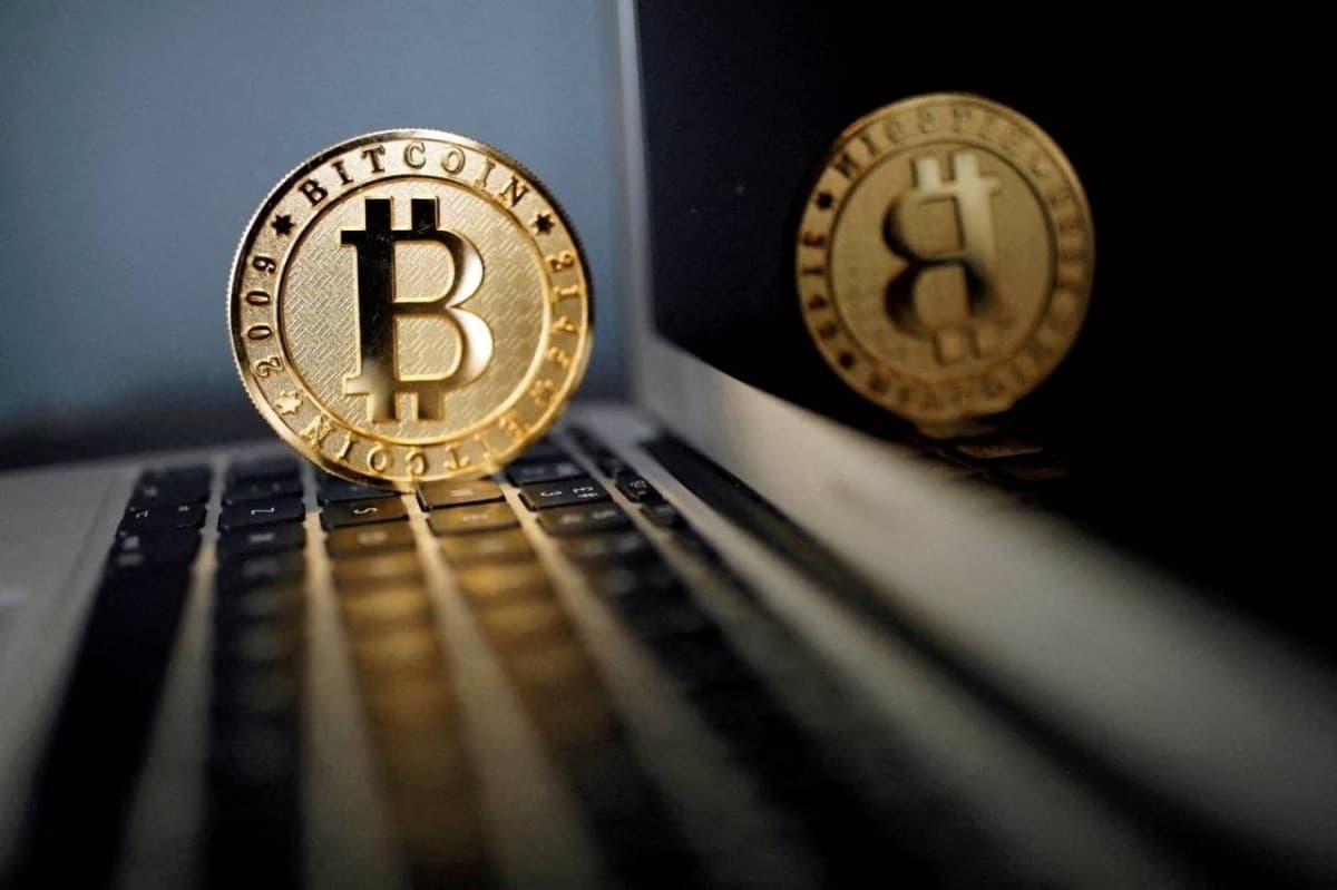 A visual representation of Bitcoin cryptocurrency against a financial market backdrop.
