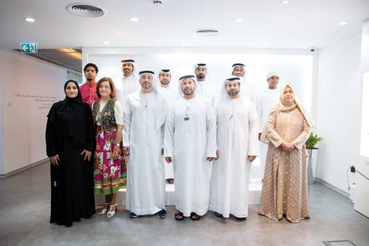 Winners of the third edition of the Most Beautiful Sustainable Home Garden in Dubai competition pose during the awards ceremony held by Dubai Municipality.
