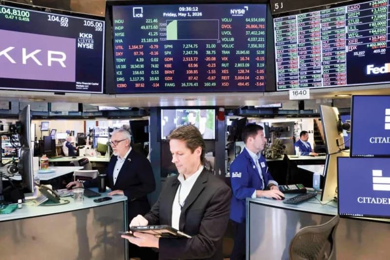 A trader monitors stock market data on screens at a US financial exchange amid gains driven by the technology sector.
