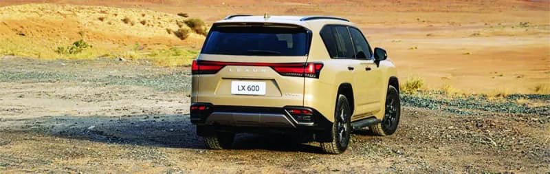 The Lexus LX600 Overtrail SUV, featuring a matte black grille, dark exterior trim, and off-road-spec 18-inch wheels.