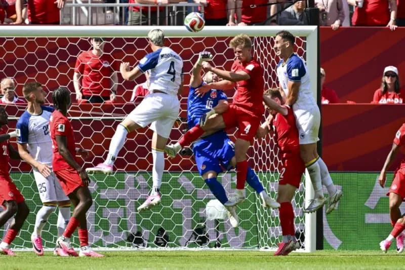 Canada players in action against Bosnia and Herzegovina at BMO Field in Toronto during their 2026 FIFA World Cup group stage match.