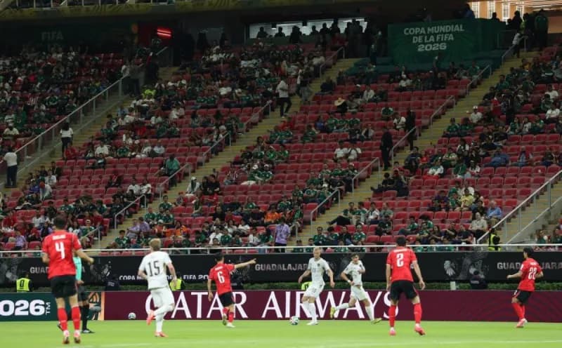 Empty seats visible in the stands of a World Cup stadium during the South Korea versus Czech Republic match in Guadalajara, Mexico.