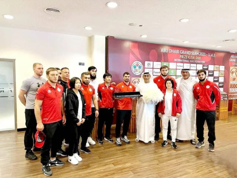 UAE national judo team athletes preparing to compete at the Qingdao Judo Grand Prix in China.