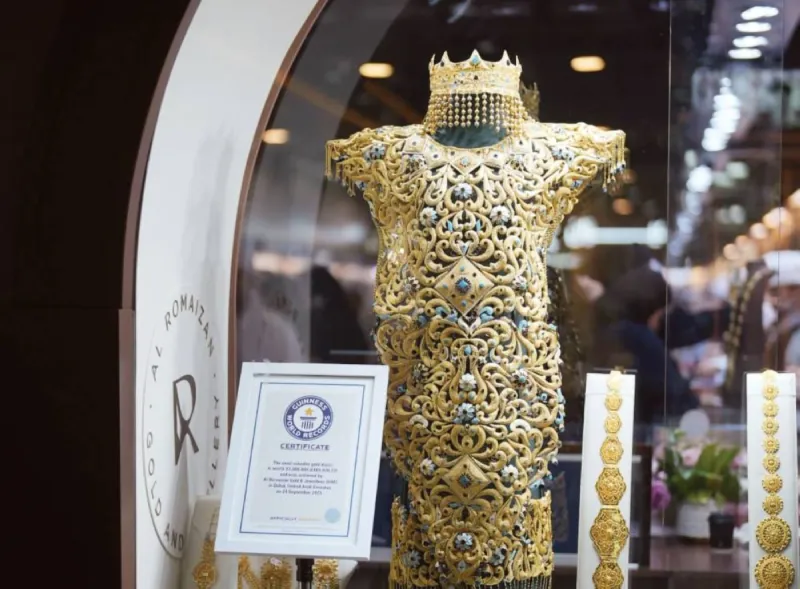 A golden dress made from over 10 kilograms of 21-karat gold, displayed by Al Rumaizān Jewellery at the Middle East Watch and Jewellery Exhibition in Expo Centre Sharjah.