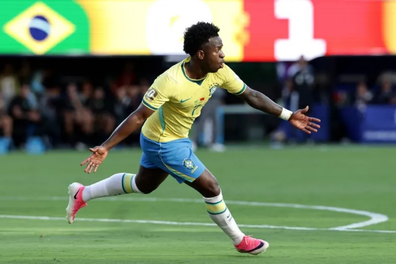 Vinicius Junior celebrates after scoring for Brazil against Morocco in their 2026 World Cup group stage match in New York.