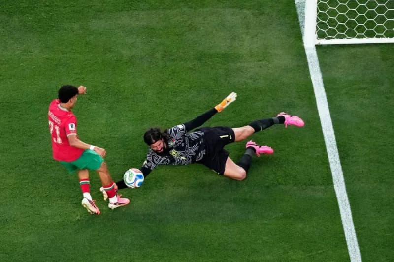 Morocco players celebrating a goal during their 1-1 draw with Brazil at the 2026 FIFA World Cup group stage.