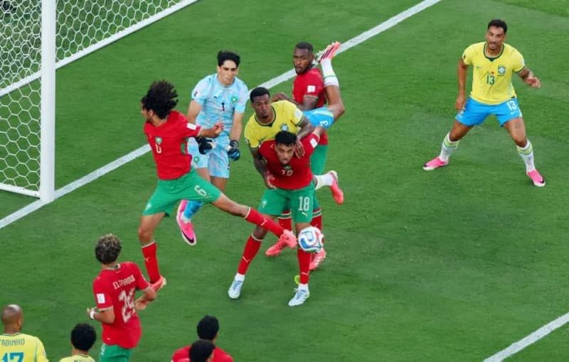 Morocco and Brazil players in action during their 2026 World Cup Group 3 match at MetLife Stadium in New York.