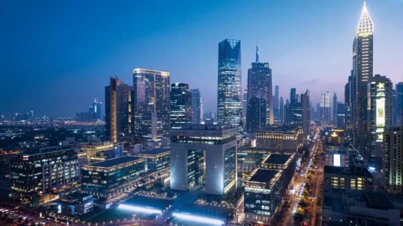 An aerial view of the Dubai International Financial Centre highlighting its towers and central business district location.