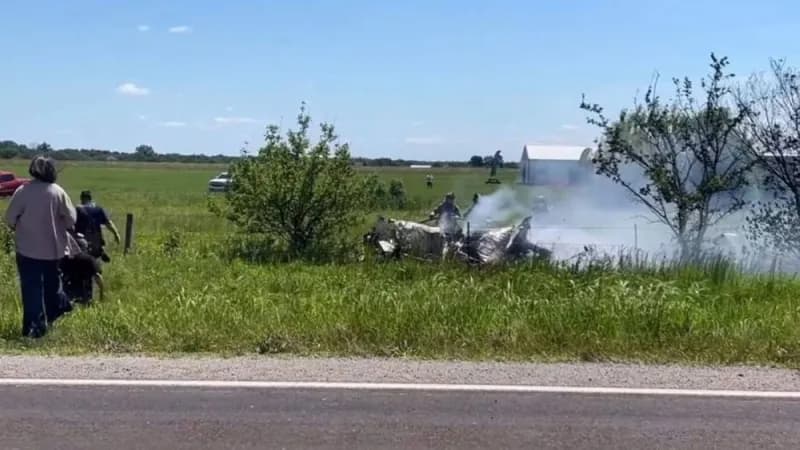 Emergency responders at the scene of a plane crash near Butler Memorial Airport in Missouri.