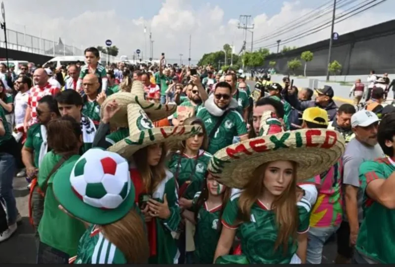 A World Cup 2026 stadium exterior with commercial signage covered, displaying the tournament's neutral venue branding.