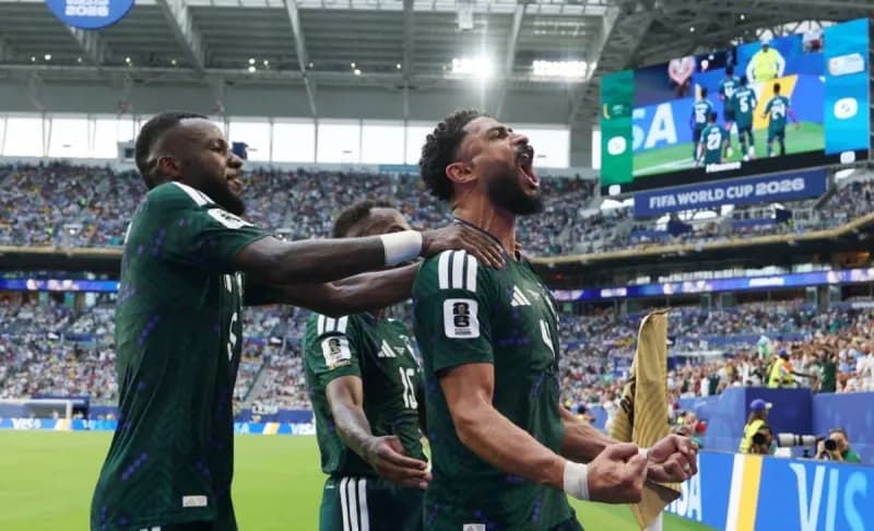 Saudi Arabia's Abdulilah Al-Amri scores against Uruguay in their 2026 FIFA World Cup Group 8 opening match.