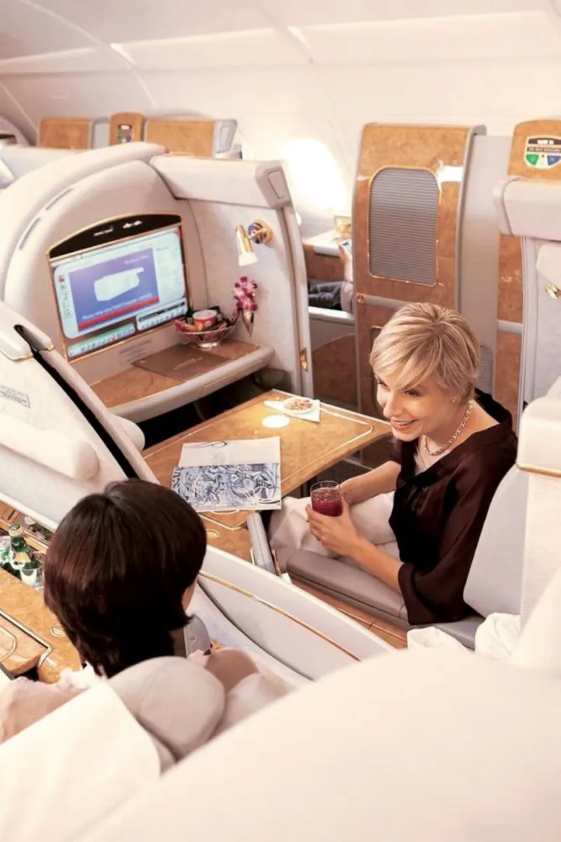 An Emirates airline Airbus A380 aircraft in flight, representing the carrier's luxury First Class product and operational model.