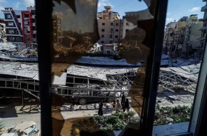 Smoke rises over a town in southern Lebanon following an Israeli airstrike targeting vehicles in the Nabatieh district.