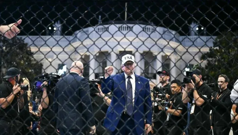 Law enforcement officers standing guard outside the White House during the UFC Freedom 250 event attended by President Donald Trump.