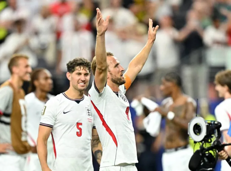 Harry Kane celebrating after scoring a penalty for England against Croatia at the 2026 World Cup.
