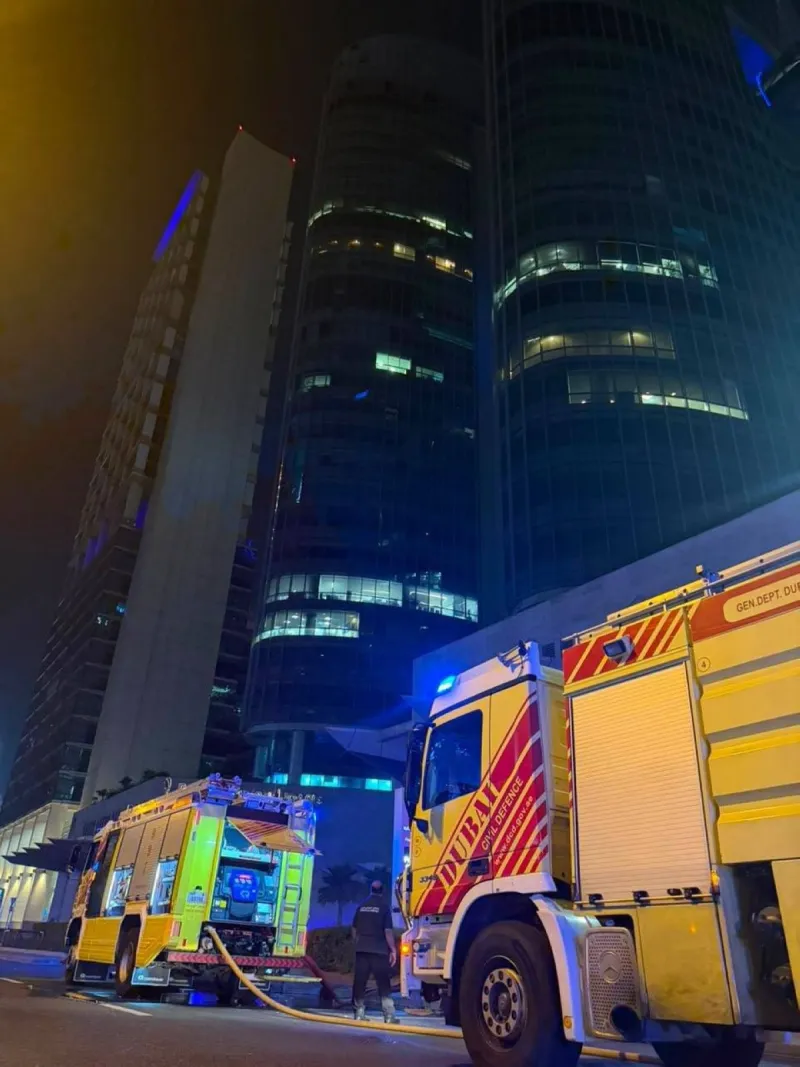 Dubai Civil Defence firefighters at the scene of a minor blaze in a building on Sheikh Zayed Road.