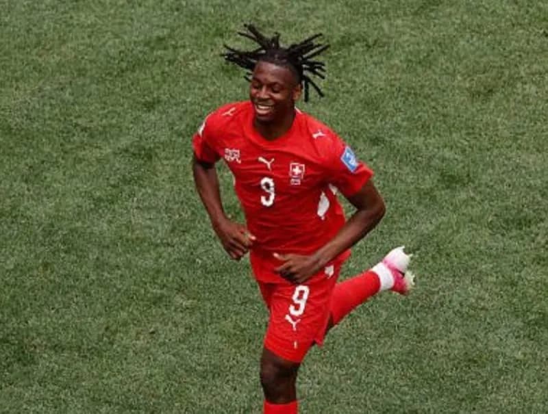 Swiss striker Jon Manzambi celebrates after scoring a brace as a substitute in Switzerland's 2026 FIFA World Cup group stage match against Bosnia and Herzegovina.