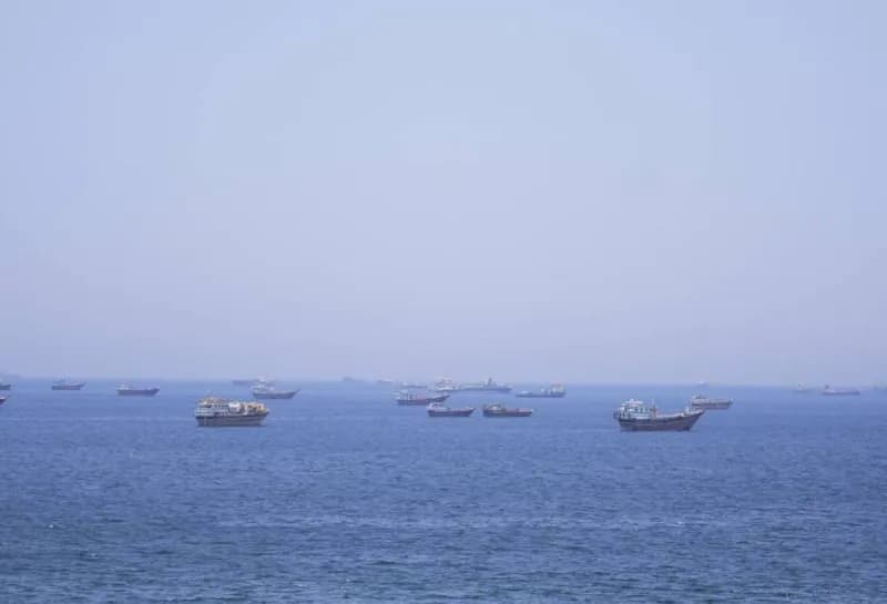 A cargo ship navigates the Strait of Hormuz amid tensions between the United States and Iran.