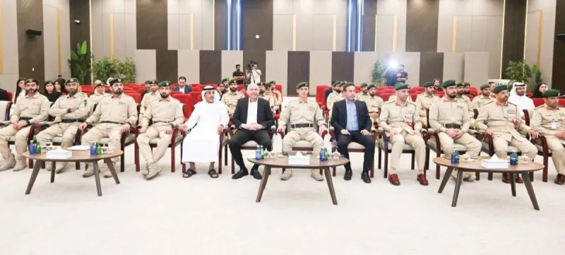 Dubai Police officials stand at the launch of the 'Drive Aware' traffic safety campaign, held in partnership with Nissan Middle East and Abdul Wahid Al Rostamani Automobiles.