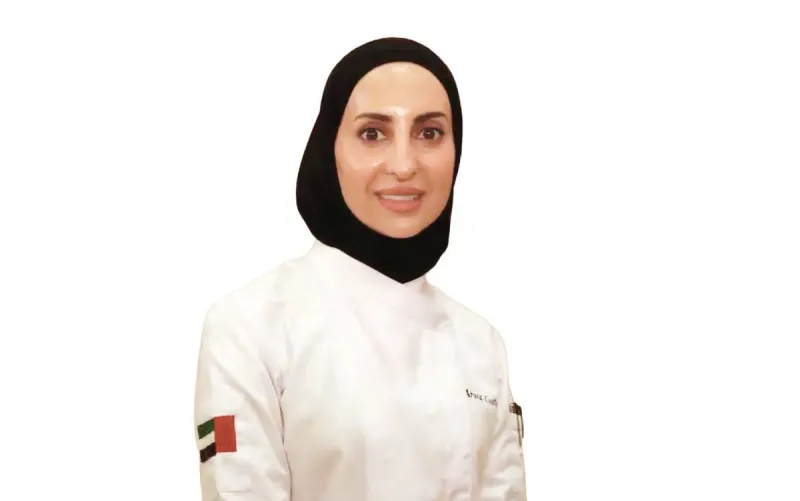 Emirati chef Arwa Lutah presenting traditional UAE dishes at the 2026 Beijing International Book Fair.