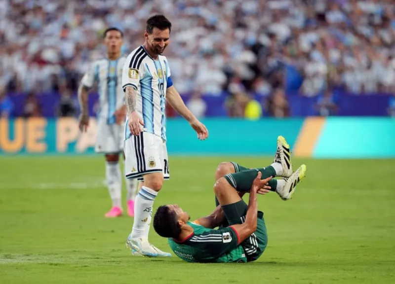 Polish referee Szymon Marciniak officiates the World Cup Group 10 match between Algeria and Argentina, which ended in a 3-0 victory for Argentina.