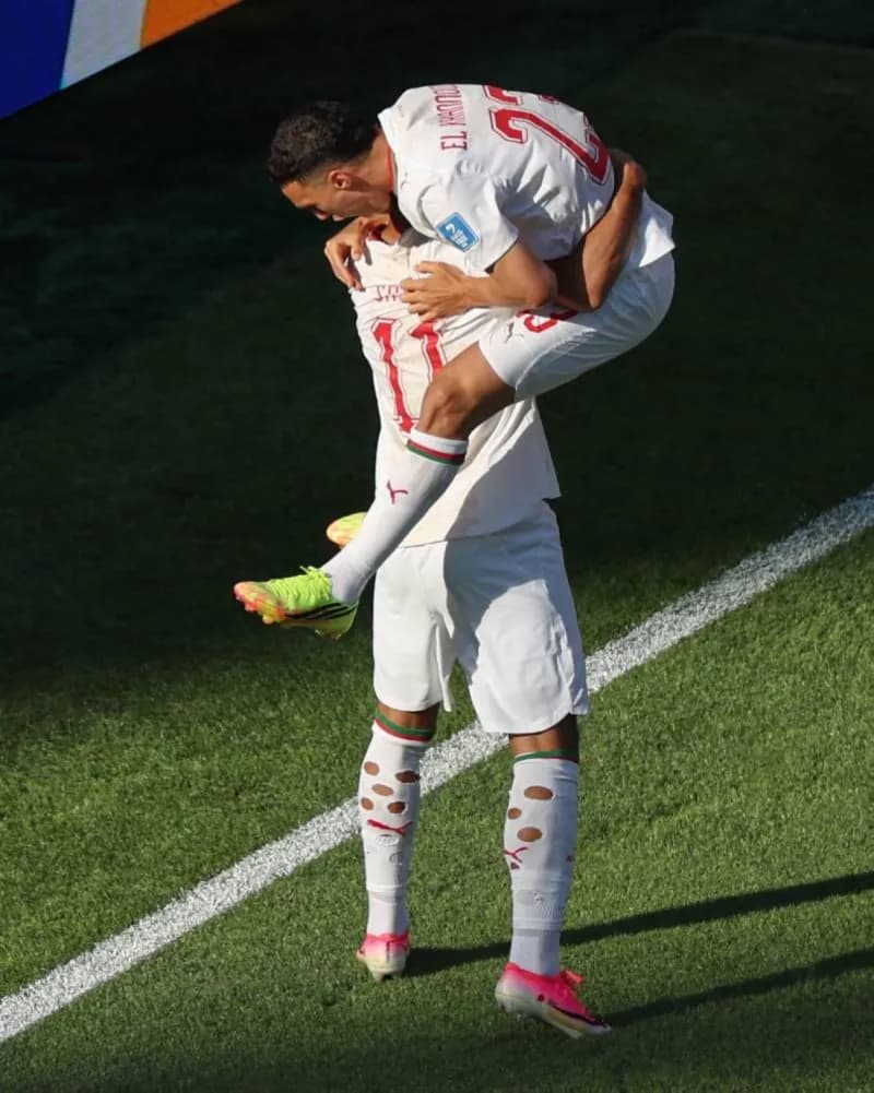 Morocco players celebrate their 1-0 victory over Scotland at the 2026 World Cup group stage.
