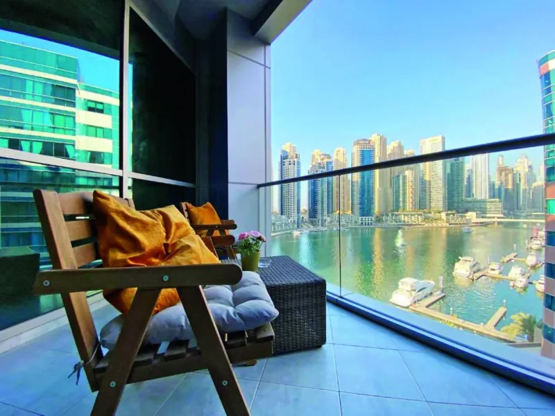A holiday home apartment in Dubai with modern furnishings, representing the short-term rental market in the emirate.
