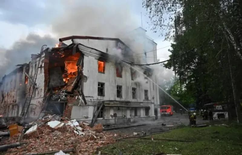 Aftermath of a Russian strike on a residential building in one of the targeted Ukrainian cities, with rescue workers searching through rubble.