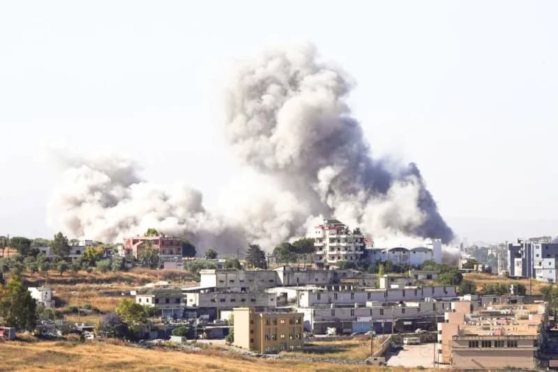 Smoke rises over southern Lebanon following Israeli airstrikes near the Nabatieh area, as seen from across the border in northern Israel.