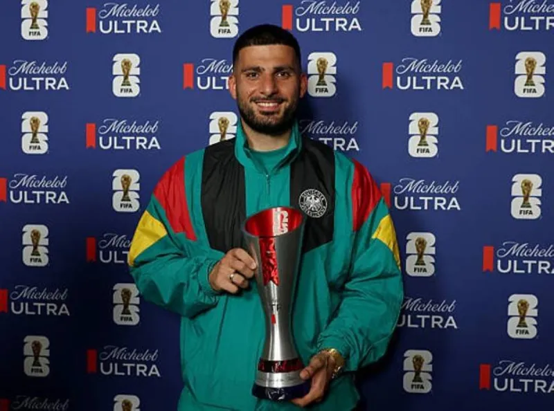 German striker Denis Undav celebrating a goal during Germany's 2026 World Cup match.