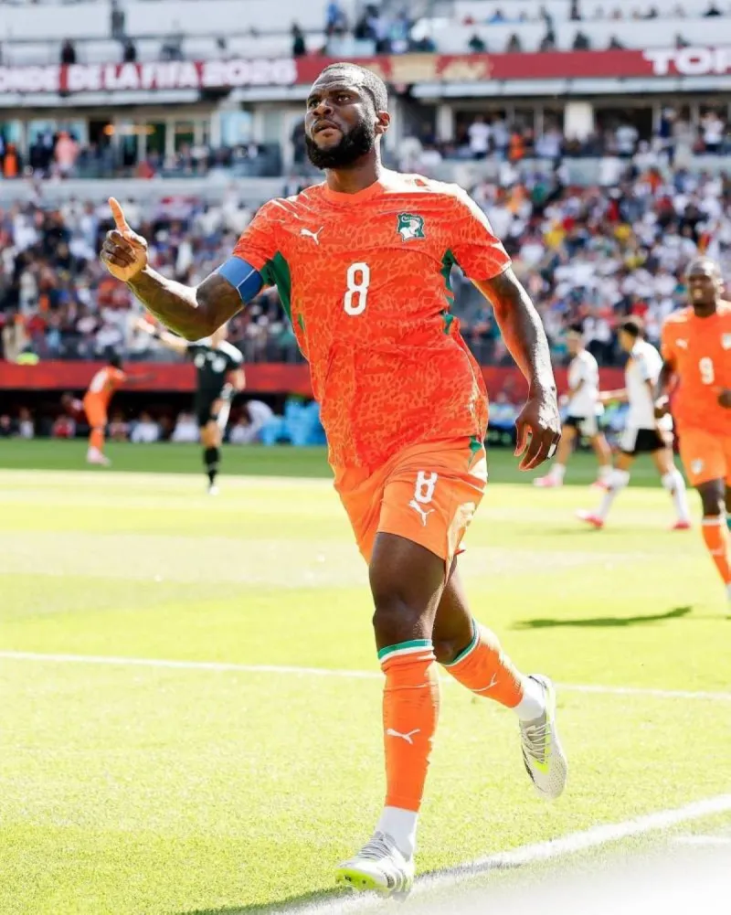 Franck Kessié celebrates after scoring for Ivory Coast against Germany at the 2026 World Cup group stage.