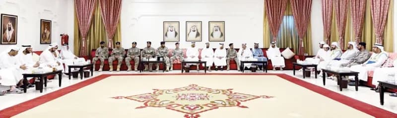 An awareness session on cybercrime for families held at the Al Qua'a Council in Al Ain, attended by community members and Abu Dhabi Police officers.