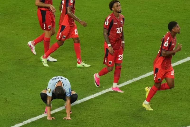 Cape Verde players celebrate their equalising goal during a dramatic 2-2 draw against Uruguay at the 2026 World Cup.