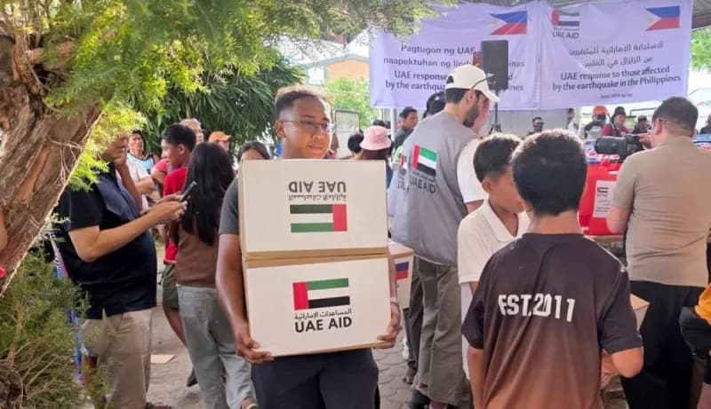 Members of the UAE response team visiting a shelter centre for earthquake victims in Sarangani Province, southern Philippines.