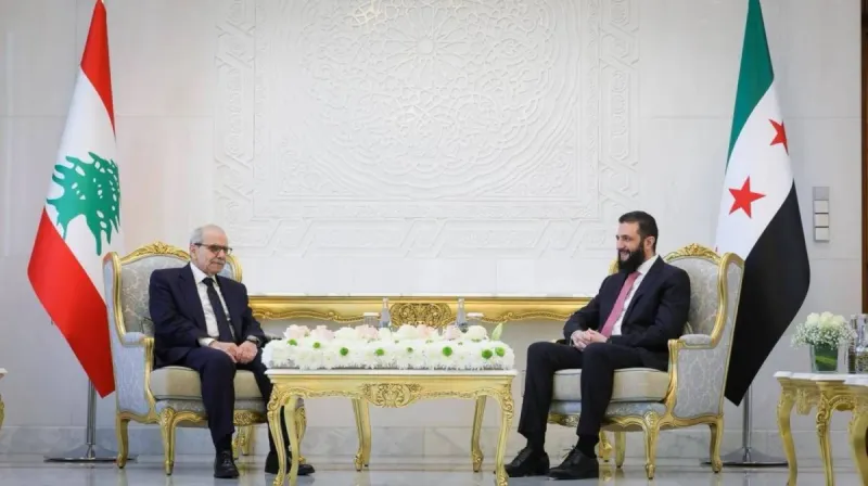 Lebanese Prime Minister Nawaf Salam speaking during a press engagement, reflecting his praise for Syrian President Al-Sharaa's televised remarks on Lebanon.