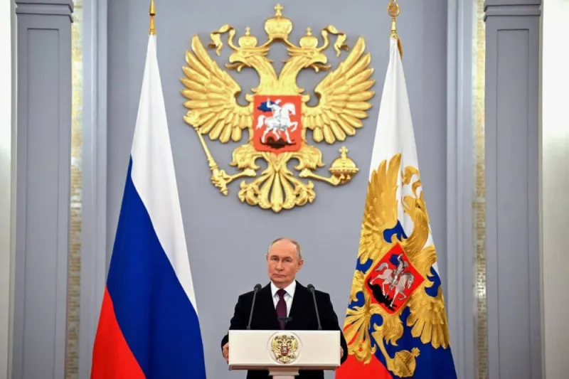 Russian President Vladimir Putin addresses graduates of Russian military academies at the Kremlin in Moscow.
