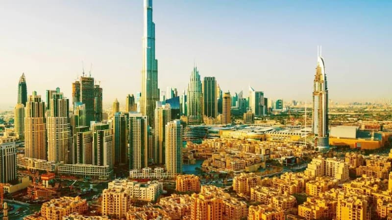 A panoramic view of Dubai's skyline, reflecting the city's status as a global investment and financial hub.