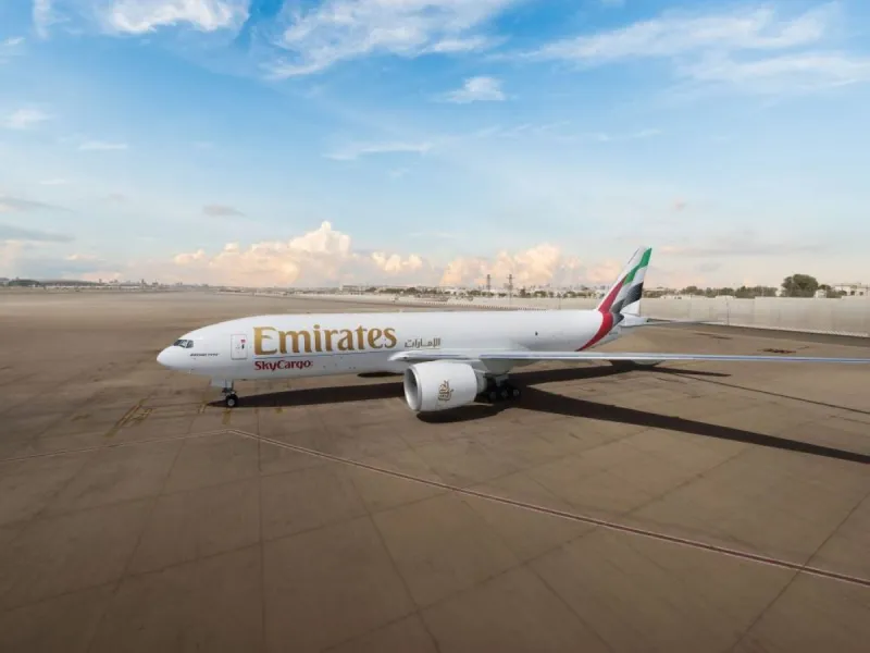 An Emirates SkyCargo freighter aircraft on the tarmac, representing the carrier's expanded air freight operations in East and Southeast Asia.