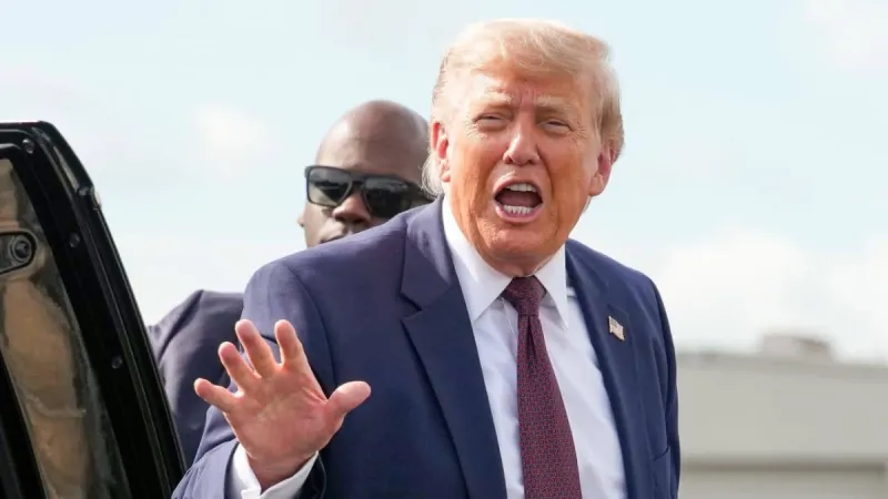US President Donald Trump speaking to reporters.