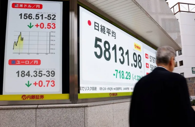 The Nikkei stock index board displaying rising figures as AI-related shares rally on the Tokyo Stock Exchange.