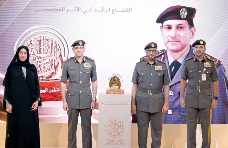 A ceremony honouring the winners of the 14th edition of the Banner of Excellence award at ICA Dubai, attended by senior officials and staff.