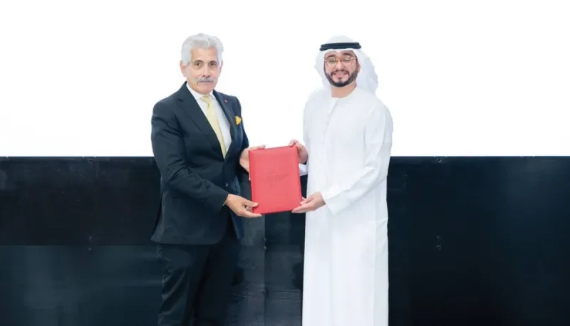 Representatives of Dubai Humanitarian and the Anwar Gargash Diplomatic Academy sign their strategic partnership agreement.